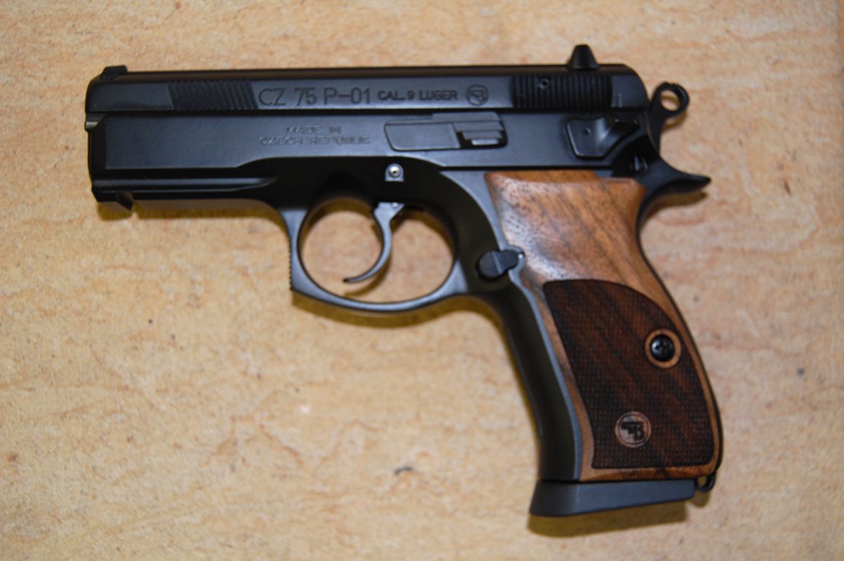 Based strictly on your non-polymer standard, I'd recommend the CZ-75 P-...